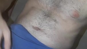 very hard penis and cum-filled testicles are caressed to ecstasy