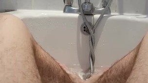 FtM twink plays in bath wiggling Big Clit in Water POV