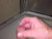 Horny in the shower, cumshot landed on the shower door glass, as it was running down, I licked it up