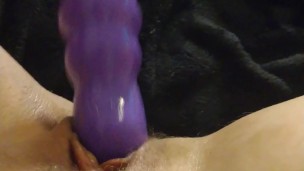 Playing with my big purple dildo