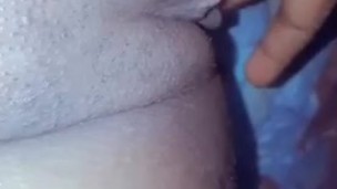 Sexy lesbian fingering her creamy pussy
