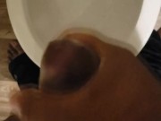 Jacking off over toilet