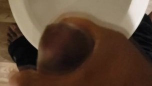 Jacking off over toilet