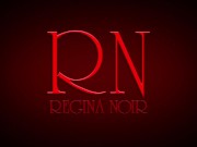 A young lady paints her toenails with black varnish. She is wearing black and white panties and a bl 1/16