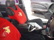 A lady masturbates in a car in a parking lot Teasing a clit with a dildo 10/16