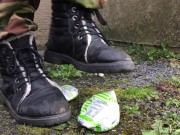 Elf stamps on cans with her dirty boots.