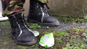 Elf stamps on cans with her dirty boots.