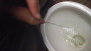 Hairy 20 y/o uncut cock pissing