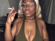 Smoking Milf teases with big tits  7/16