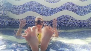 Tik Tok. Sexy blonde babe swims, masturbates in the swimming pool. Play in water. 