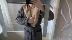 Undressing in the bathroom mirror