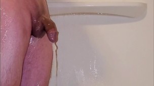 Hung teen stripping and showering his big cock