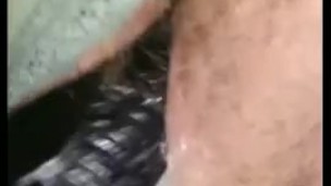 Fucking her hairy pussy with black dildo