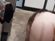 Alternative goth girl strips at public laundromat