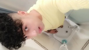 Peeing to the sink with uncut cock
