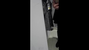 TS cum in chastity cage in dressing room