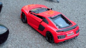 Crush of Red Audi R8 model toy car with Black Pump Stilettos