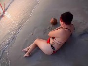 Nice lady at lonely nudist beach. Red swimsuit. Red bikini. Coconut 10/16