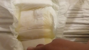 Pissing in open adult diaper