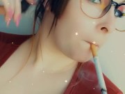 Smoking Marlboro red 100s 1/16