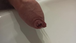 morning long foreskin pee closeup