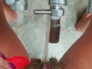 Tik Tok Standing pee on the tap in the bathroom 
