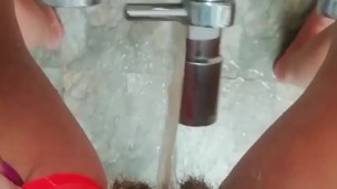 Tik Tok Standing pee on the tap in the bathroom 