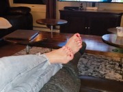 Sexy feet and jeans with toe rings and red polish