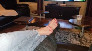 Sexy feet and jeans with toe rings and red polish 