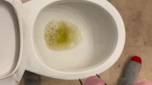 Taking a yellow piss while working on a house