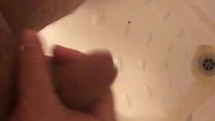 Masturbating and wanking my hard cut cock under the shower with huge cumshot
