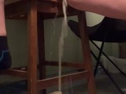 Quick pee outside on a chair