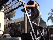 She climbs a forklift and Pedal Pumps in Sexy Tights with Boots