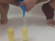 Pissing in shot glasses