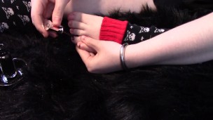 Red Vinyl Kitty Paints Her Toenails While Wearing Skull Legwarmers Preview