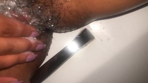 Hairy pussy getting washed