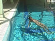 Swimming pool babe strips naked and gets horny underwater 14/16