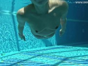 Swimming pool babe strips naked and gets horny underwater 16/16