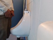 Me peeing in a public urinal