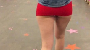Schoolgirl in Miniskirt flashing booty in mall