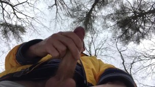 Masked uncut Maine boy cruising outside in the park 