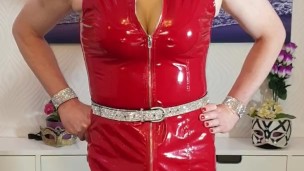 Sissy Lucy wanking her big uncut cock in PVC dress with big  tits