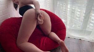 sex with a dildo at the window