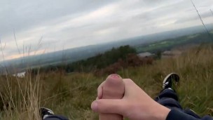 TEEN JERKING OFF IN PUBLIC FIELD