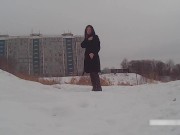 Winter street photoshoot in a fur coat on a naked body 10/16