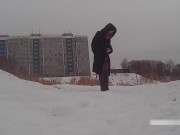 Winter street photoshoot in a fur coat on a naked body 2/16