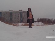 Winter street photoshoot in a fur coat on a naked body 4/16