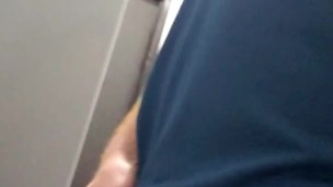 Ginger pissing in public restroom 