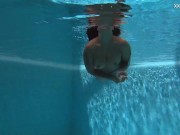 Chubby babe Puzan Bruhova swims naked in the pool 13/16