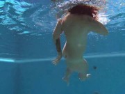 Chubby babe Puzan Bruhova swims naked in the pool 14/16